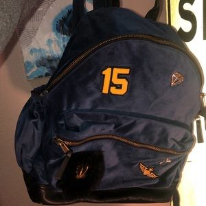 Blue Valore back pack with added gold designs
